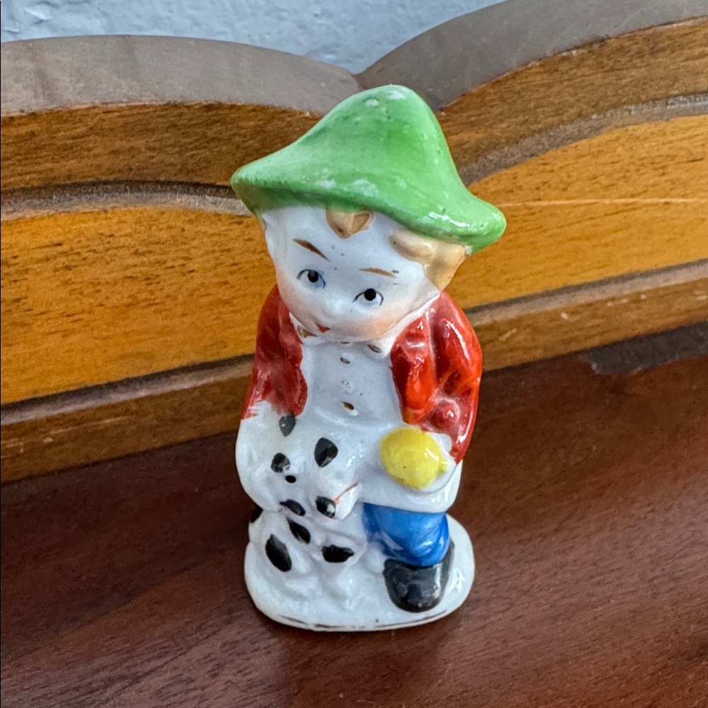 Occupied Japan Glazed Ceramic Boy with Black and White Spotted Dog